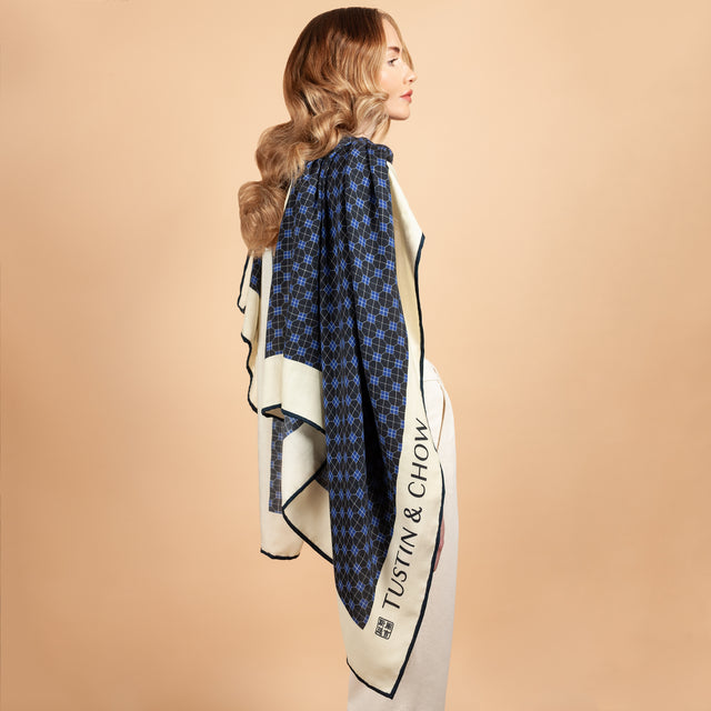 Tustin & Chow Cashmere Silk Travel Blanket in blue and natural Draped